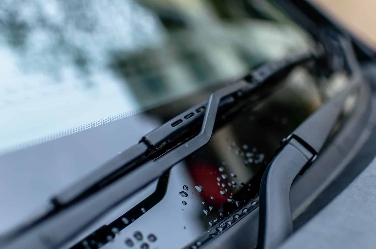 A close up of a car windshield wiper.